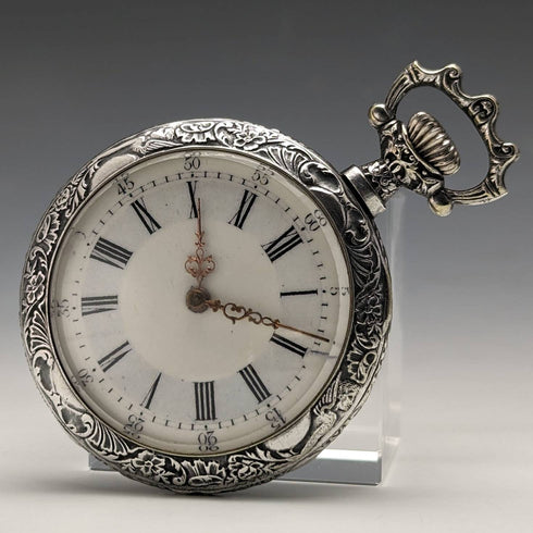 Antique Swiss made unsigned pocket watch with embossed silver plate case works well